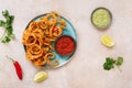 Indian onion bhajis with two sauces Royalty Free Stock Photo