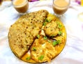 Indian pakistani Asian breakfast Allo paratha tea omelate