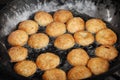 Indian pastries in a pan on the open market Royalty Free Stock Photo
