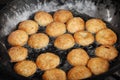 Indian pastries in a pan on the open market