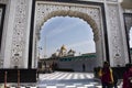 Indian people and foreign travelers travel at Sri Bangla Sahib Gurudwara or Sikh gurdwara temple worship in New Delhi, India Royalty Free Stock Photo