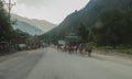 Indian people foreigner ride a horse in Leh main bazaar at Leh Ladakh city on July 1, 2017 in Jammu and Kashmir, India