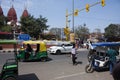 Indian people drive car and ride and bike and walk on street with traffic road at Hindu Shrine and red fort at India Royalty Free Stock Photo