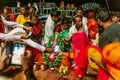 Indian people got bless in Varanasi Ganga Aarti at holy Dasaswamedh Ghat, near Kashi Vishwanath Temple while raining at night.