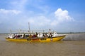 The Indian people take a boat ride on the Ganges