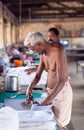 Indian people working Dhobi Ghat in Cochin, India Royalty Free Stock Photo