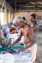 Indian people working Dhobi Ghat in Fort Cochin, India Royalty Free Stock Photo