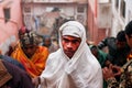 Indian pilgrims dressed in white rises to ancient Temple