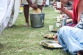 Indian pilgrims are going to eat sacred food called Prasadam - this is an important part of the ritual of worship of the