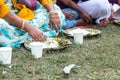 Indian pilgrims are going to eat sacred food called Prasadam - this is an important part of the ritual of worship of the