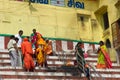Indian pilgrims on the steps of the sacred bath