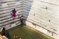 Indian pilgrims on the steps of the sacred bath