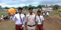 Indian police man standing with school boys during an Independence Day program