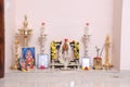 indian pooja room with pictures of gods and kuthuvilaku Royalty Free Stock Photo