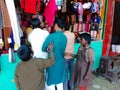 indian poor begger kids asking for money at garment store in india dec 2019 Royalty Free Stock Photo