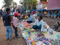 indian poor kids buying toys at street shop in india January 2020