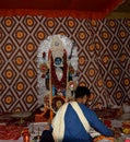 Indian priest doing Kali Puja at a temple in india