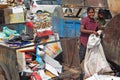 Indian rag pickers search for recyclable material in the garbage collection center on