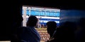 Indian railway passengers watching outside the train at railway station in India Oct 2019 Royalty Free Stock Photo