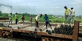 indian railway worker on the job for loading goods in train in India aug 2019