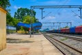 Indian Railways Station With Train, Platform, Overbridge & Nature 02. Royalty Free Stock Photo