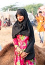 Indian Rajasthani woman with Camel at Pushkar Royalty Free Stock Photo