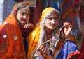 Indian Rajasthani women in traditional clothes selling beads at local market, Rajasthan