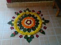 Indian rangoli made up with flower Petals and Leaves.