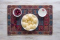 Indian Rasgulla dessert. Sweet served in a bowl, top view