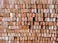 Indian red brick background or texture is arranged on side or new brick on construction side , home construction for bricks Royalty Free Stock Photo