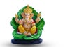 Indian Religion concept. Lord Ganpati, resting on a green leaf, white background Royalty Free Stock Photo