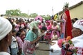 Indian Religious ritual give money for San Pedro