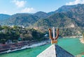 Indian religious symbol trishul with mountain and blue sky background