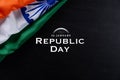 Indian republic day concept. Indian flag with the text Happy republic day against a blackboard background. 26 January