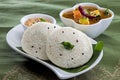 Indian Rice cake with Lentil curry. South Indian Breakfast. Idali Sambar idli food