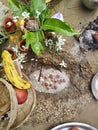 An Indian ritual with fruits, mango leaf, a small pond made in samd Royalty Free Stock Photo