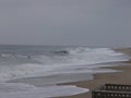 Indian river inlet beach during a nice swell Royalty Free Stock Photo