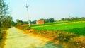 Indian road and house field picture