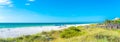 Indian rocks beach with green grass in Florida, USA Royalty Free Stock Photo