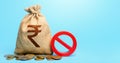 Indian rupee money bag and red prohibition sign NO. Monetary restrictions, freezing of bank accounts. Termination projects. Royalty Free Stock Photo