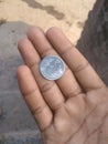 Indian rupees with right hand