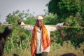 Indian rural men herding flock of sheep Royalty Free Stock Photo