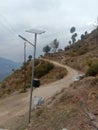 Indian rural road bear school and road lamp Royalty Free Stock Photo