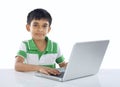 Indian School Boy with Laptop Royalty Free Stock Photo