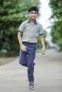 Indian school boy playing hop-scotch in playground Royalty Free Stock Photo