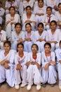 Indian school girls sitting at Qutub Minar, Delhi, India