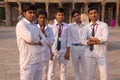 Indian school students standing in the courtyard of Quwwat-Ul-Islam mosque, Qutub Minar, Delhi, India Royalty Free Stock Photo