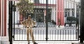 Indian Security Guard in Khaki Clothe Guarding gates