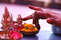 Indian Selective focus of bride and groom Performing traditional Ganesh Puja or pooja before indian hindu wedding ceremony. Royalty Free Stock Photo