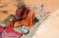 Indian senior blind woman seeks alms or begs on road to temple d